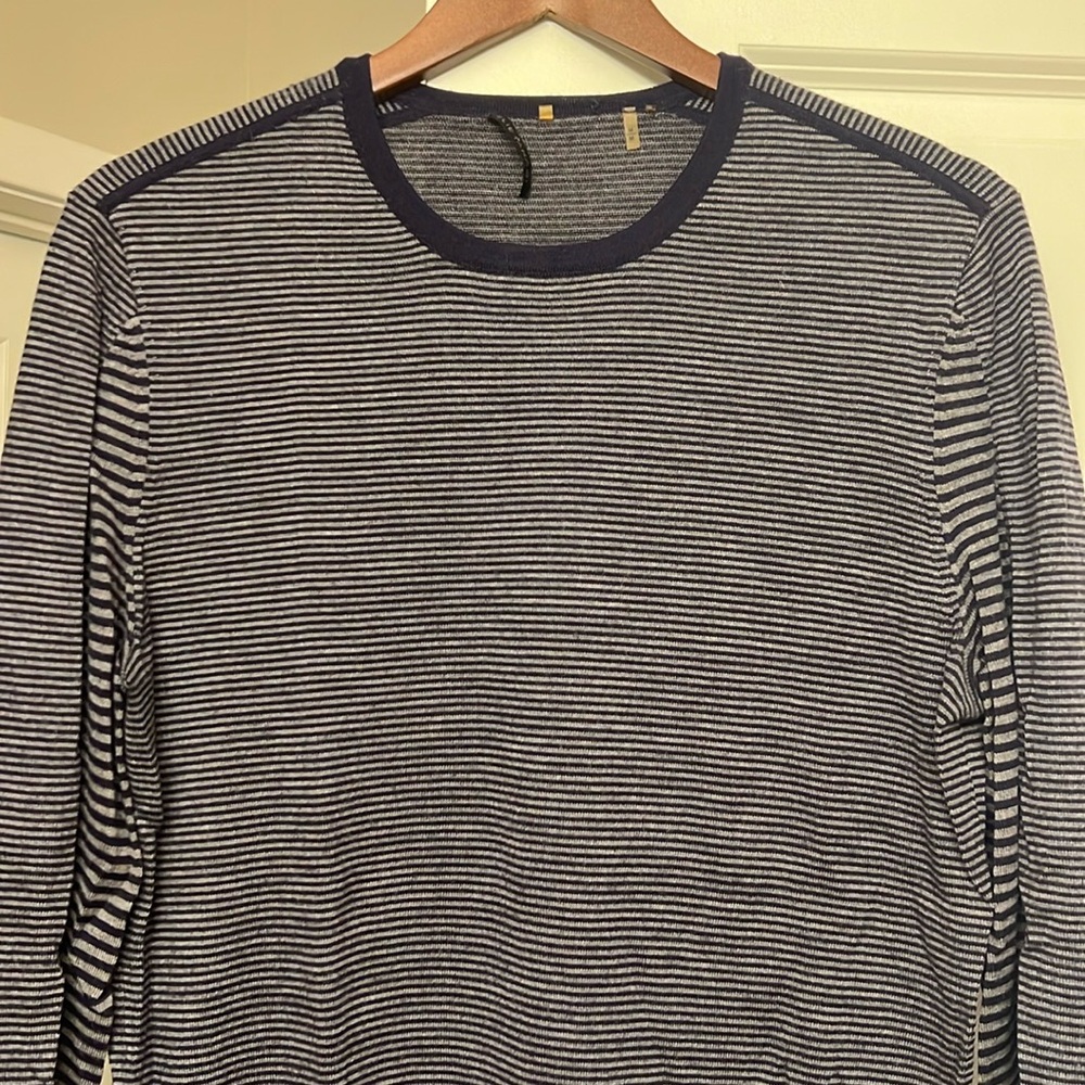 Dark blue and grey shirt. 29 inches in length